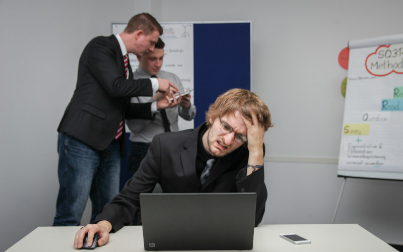 Overwhelmed team handling technology chaos